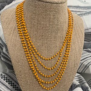Raw and rebellious orange multi layered necklace